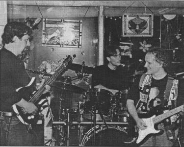 P3 - bassist Paul Kollar, drummer Phil Wylie and guitarist Paul Barton (from left) played to a packed house at just the trio\'s second-ever show at The Coffee Mill on Saturday.